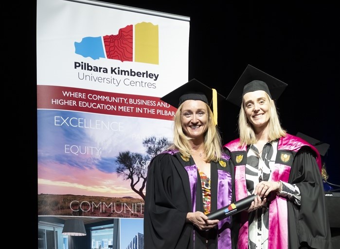 Picture: Nicola Yalden accepting her PKUC graduation certificate with Curtin University's Kelly Nowak, Photo Credit Flying Fox Media